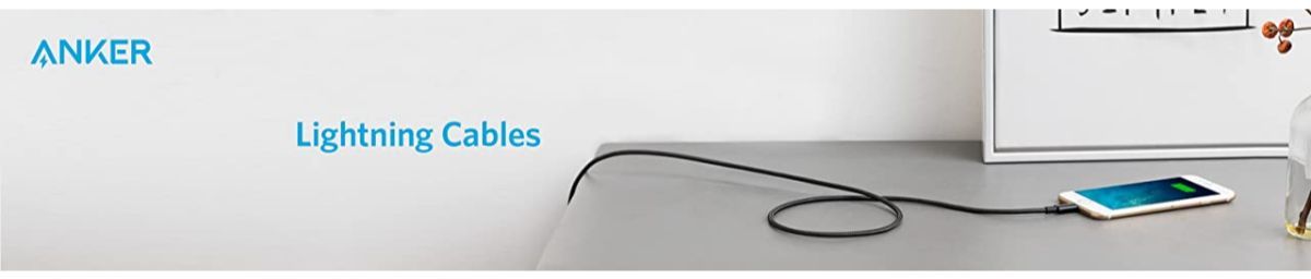 Anker Lightning cable charging phone on desk, Anker Kuwait