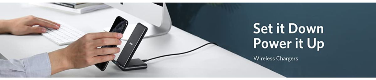 Wireless charger on desk with phone being placed, Anker Kuwait