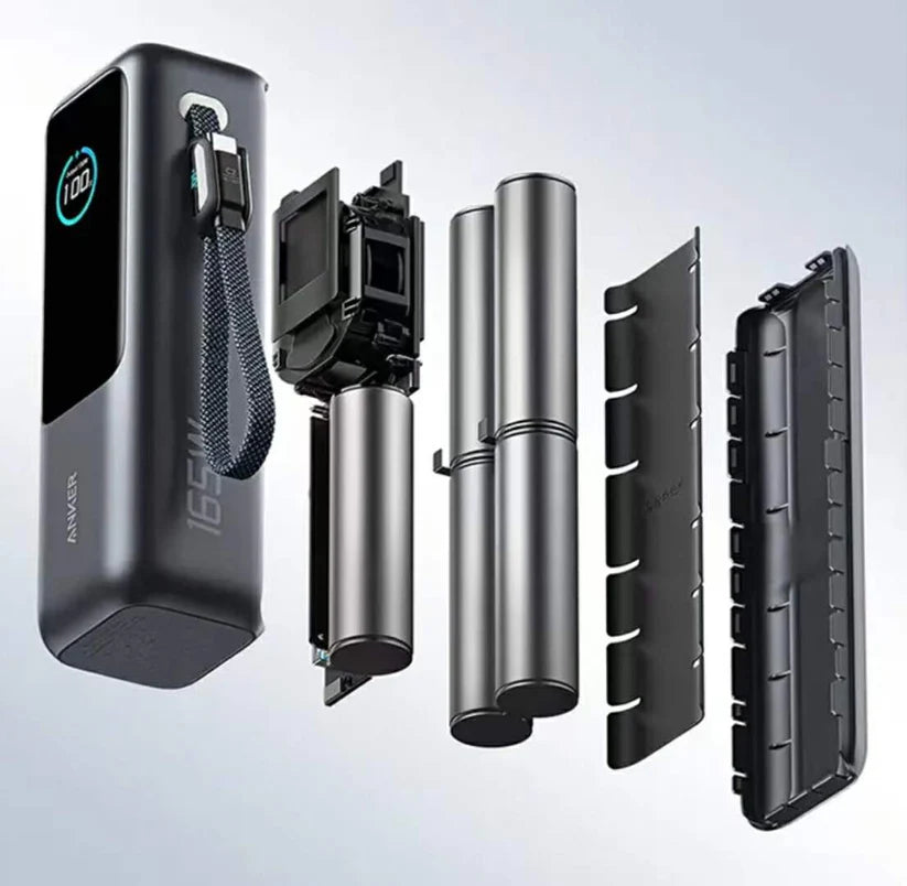 Anker 165W power bank with internal battery components shown, featuring digital display and USB-C ports