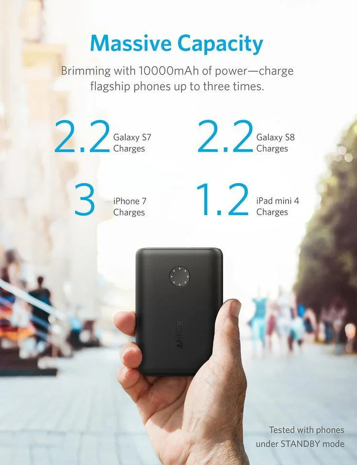 Anker 10000mAh power bank held in hand, charges iPhone, Galaxy, iPad — Anker Kuwait