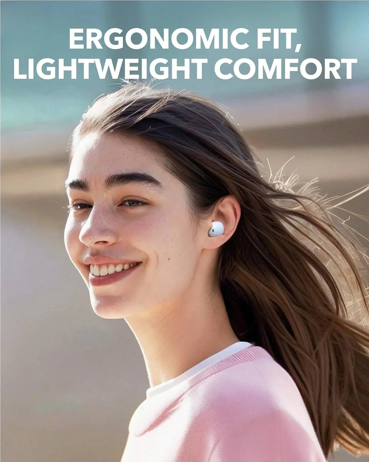 Woman wearing white wireless earbuds with ergonomic fit, lightweight comfort — Anker Kuwait