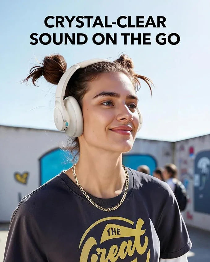 Woman wearing white wireless headphones outdoors, crystal-clear sound on the go, Anker Kuwait