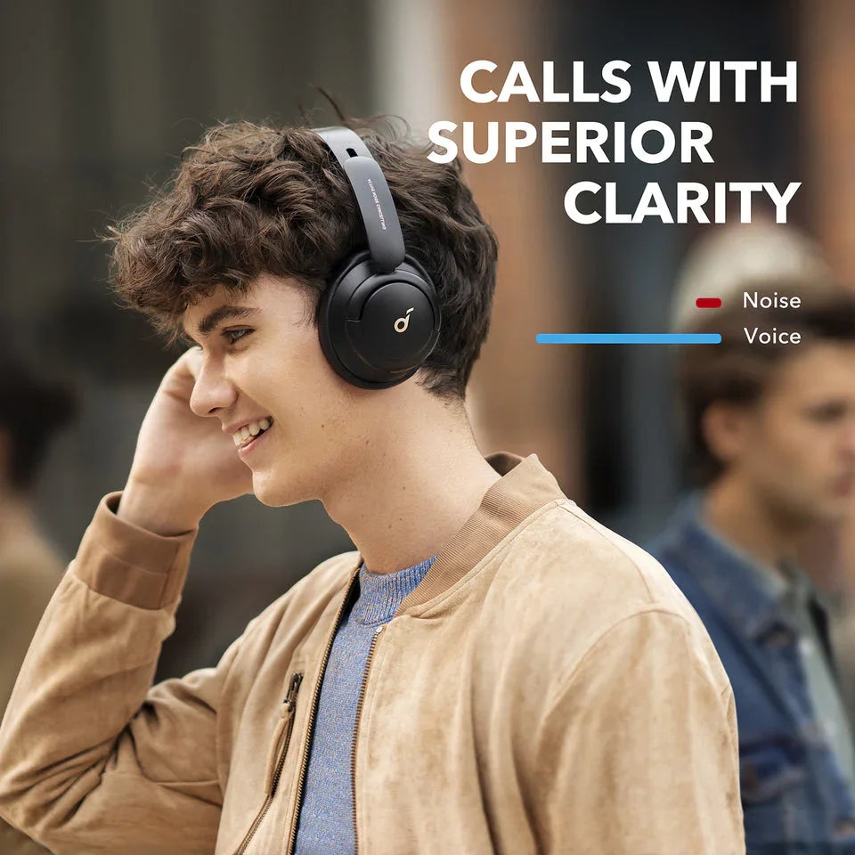 Man wearing noise-canceling headphones for superior call clarity, Anker Kuwait