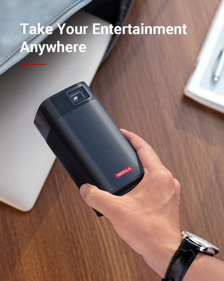 Portable Nebula projector held in hand for on-the-go entertainment, Anker Kuwait