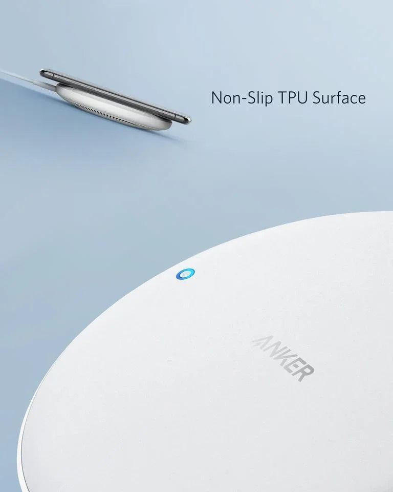 Anker wireless charger with non-slip TPU surface, featuring blue LED indicator and sleek white design