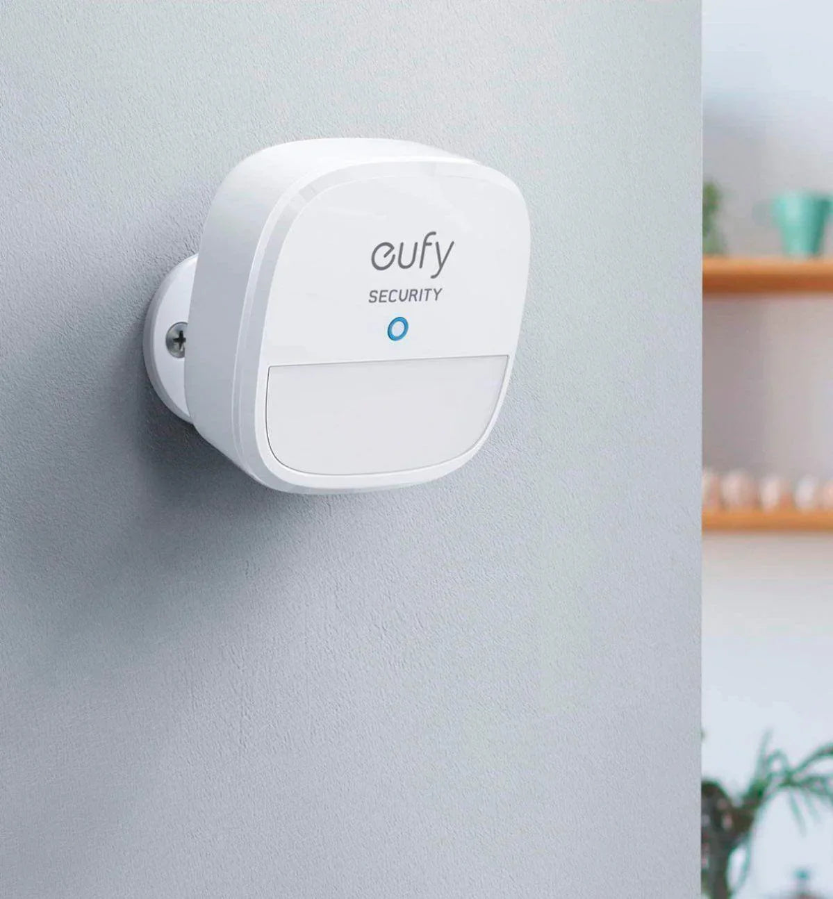 Eufy Security motion sensor mounted on wall, smart home safety device