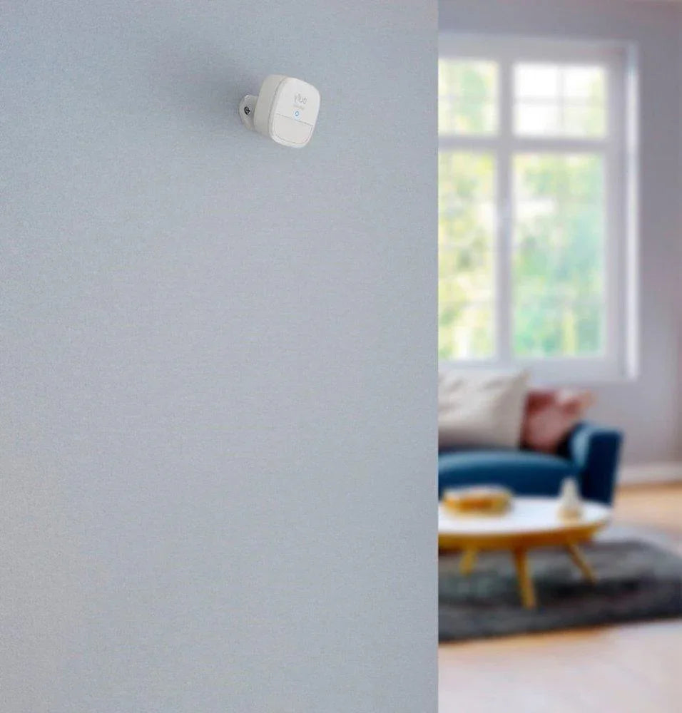 Smart plug mounted on wall in modern living room, Anker Kuwait